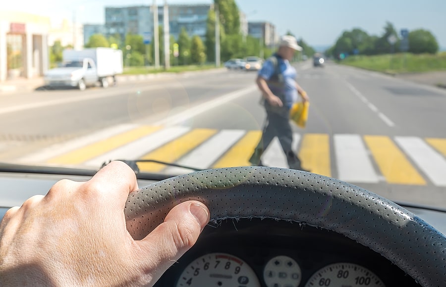 Do drivers have to wait for pedestrians to Cross Street?